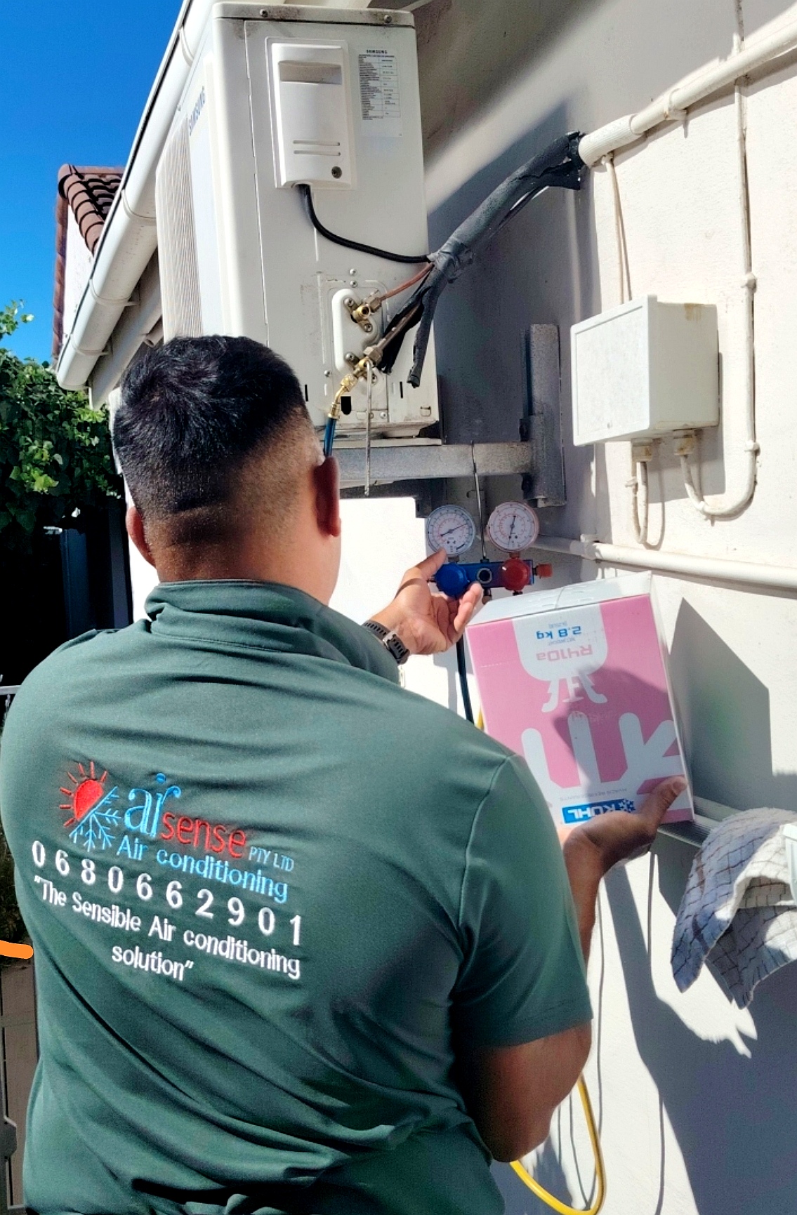 Airsense Airconditioning technician wearing branded workwear in Cape Town