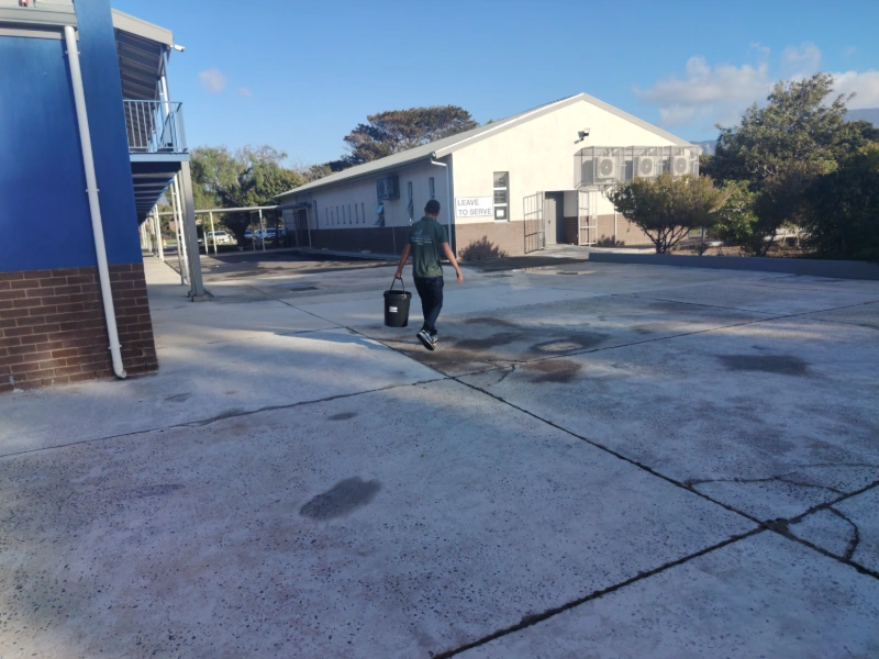 Air conditioning technician carrying out maintenance service