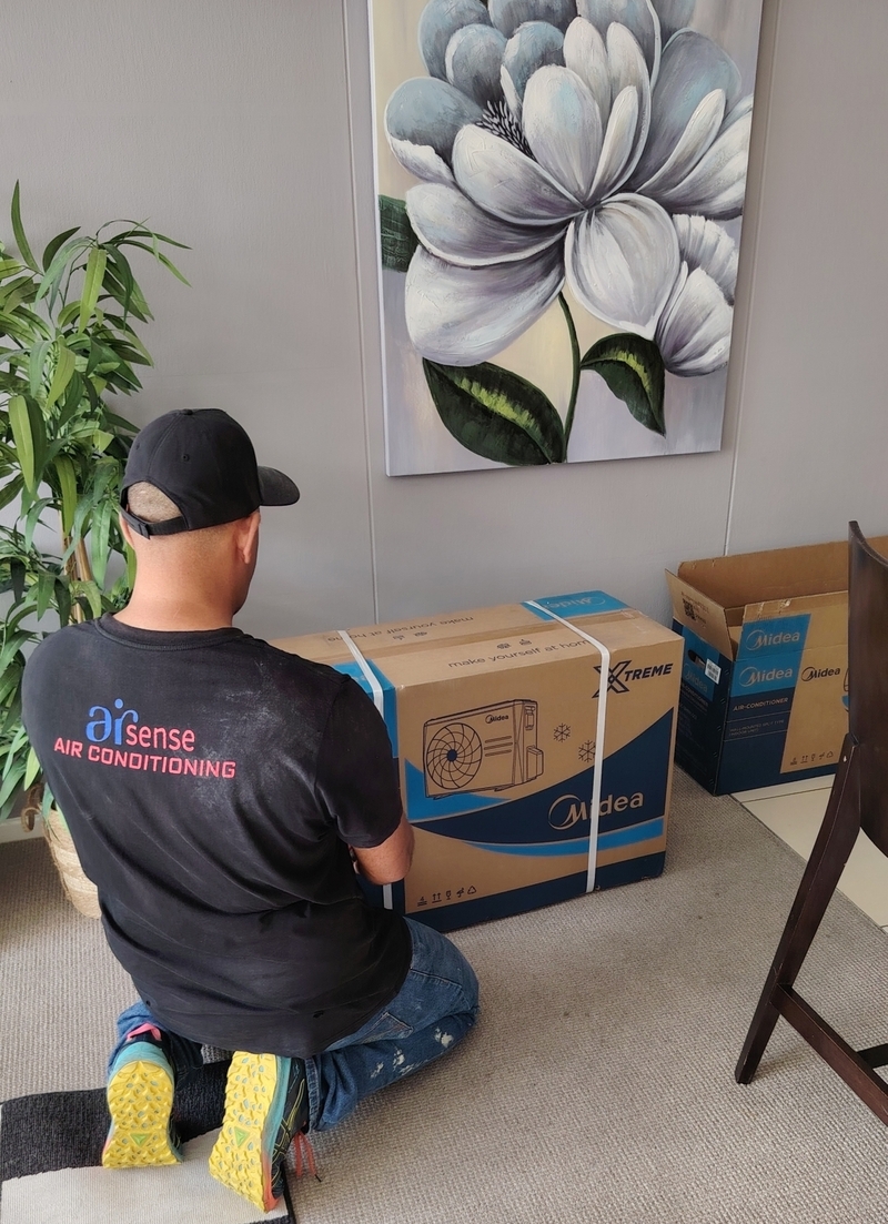 Installation in progress, Midea Xtreme inverter, for our customer in Atlantic Views, Sea Point, Cape Town 